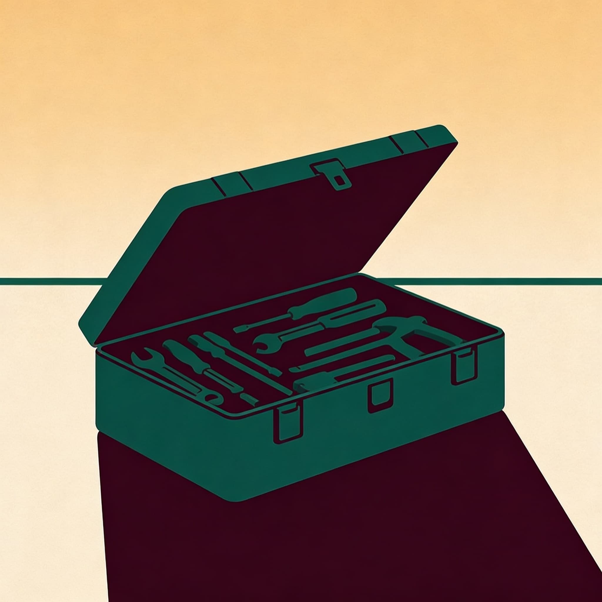 An open toolbox seen from above, tools arranged in clear order, ready for the work.